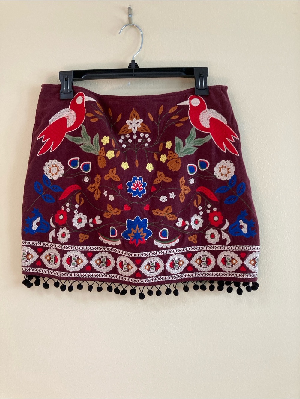 Umgee Burgundy Embroidered Mini Skirt with Pom Fringe